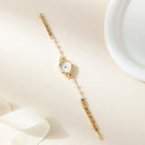 Ana® - Elegant Gold Watch Featuring a Pearl Bracelet