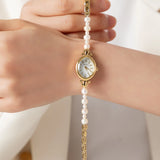 Ana® - Elegant Gold Watch Featuring a Pearl Bracelet