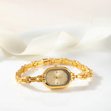 Helena® - Elegant Gold Watch Featuring an Oval Dial and Sleek Black Frame