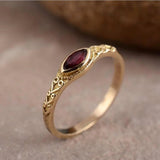 Antique Gold Ring Featuring a Red Crystal