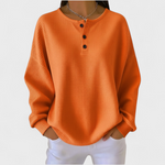 Orla waffle knit henley jumper for women in orange by Ellie Dublin