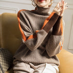 Éléonore rullekravesweater med chevronmønster fra Elsebeth København, styling med jeans