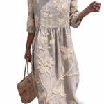 Coralie - Casual women's dress with floral pattern.