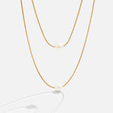 Caroline – Double Row Gold Chain with Dark Gemstone